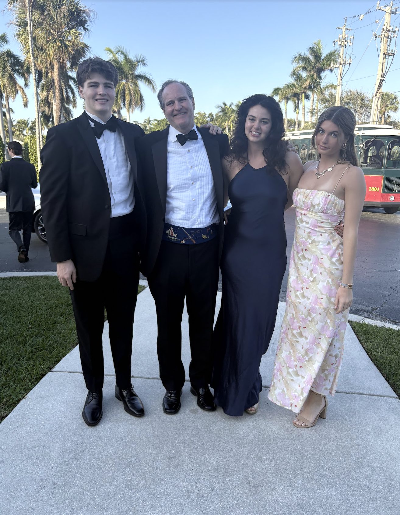Brooke with family dressed for a formal event